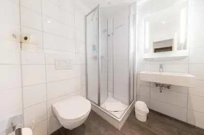 Ein Badezimmer in der Unterkunft Cuxlandhotel Studio 121