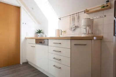 Küche/Küchenzeile in der Unterkunft Ferienwohnung Sieltrift 4-13