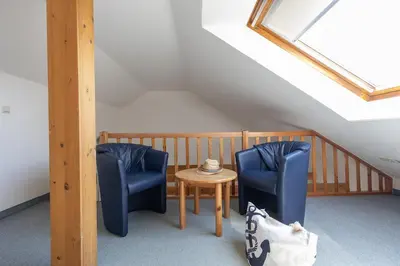 Ein Sitzbereich in der Unterkunft Ferienwohnung Lilli Marleen 7-14