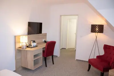 TV/Unterhaltungsangebot in der Unterkunft Cuxlandhotel Doppelzimmer 118