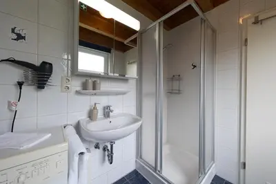 Ein Badezimmer in der Unterkunft Ferienhaus 