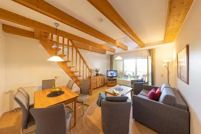 Ein Sitzbereich in der Unterkunft Ferienwohnung Lilli Marleen 3-33