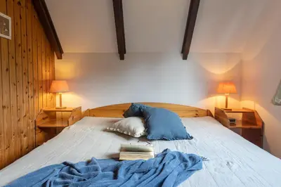 Ein Bett oder Betten in einem Zimmer der Unterkunft Ferienhaus Robbenplate 11