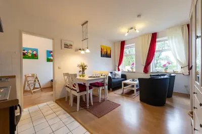 Ein Sitzbereich in der Unterkunft Ferienwohnung Sieltrift 4-04