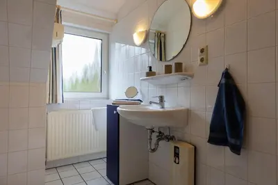 Ein Badezimmer in der Unterkunft Ferienwohnung 