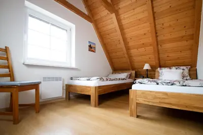 Ein Bett oder Betten in einem Zimmer der Unterkunft Ferienhaus Tegeler Plate 16