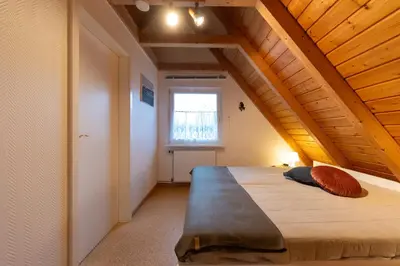 Ein Bett oder Betten in einem Zimmer der Unterkunft Ferienhaus 