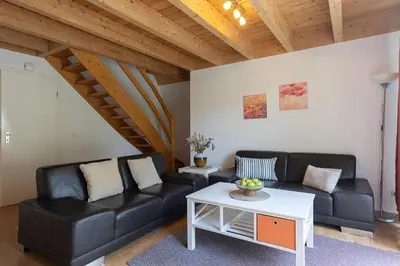 Ein Sitzbereich in der Unterkunft Ferienhaus Westertill 23