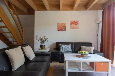Ein Sitzbereich in der Unterkunft Ferienhaus Westertill 23