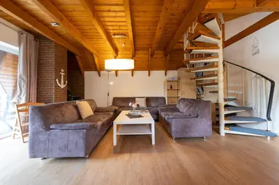 Ein Sitzbereich in der Unterkunft Ferienhaus 