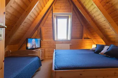 Ein Bett oder Betten in einem Zimmer der Unterkunft Ferienhaus 