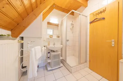 Ein Badezimmer in der Unterkunft Ferienhaus Medemsand 12