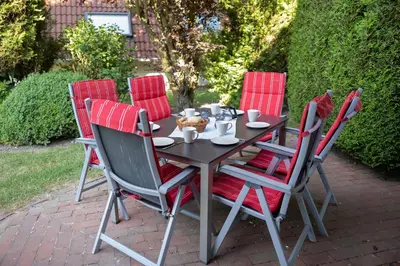 Ein Garten an der Unterkunft Ferienhaus Knechtsand 34