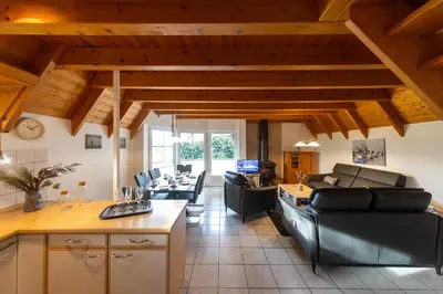 Ein Sitzbereich in der Unterkunft Ferienhaus Kniepsand 09