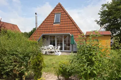 Ein Garten an der Unterkunft Ferienhaus Knechtsand 05
