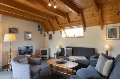 Ein Sitzbereich in der Unterkunft Ferienhaus Westertill 10