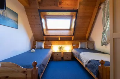 Ein Bett oder Betten in einem Zimmer der Unterkunft Ferienhaus 
