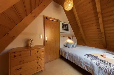 Ein Bett oder Betten in einem Zimmer der Unterkunft Ferienhaus Eversand 04