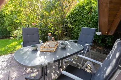 Ein Garten an der Unterkunft Ferienhaus Tegeler Plate 30