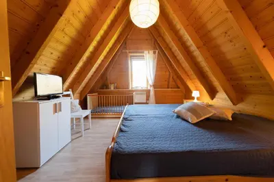 Ein Bett oder Betten in einem Zimmer der Unterkunft Ferienhaus 