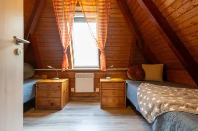 Ein Bett oder Betten in einem Zimmer der Unterkunft Ferienhaus 