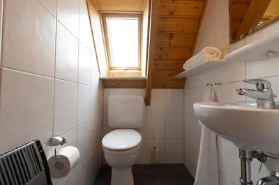 Ein Badezimmer in der Unterkunft Ferienhaus Mellumplate 38