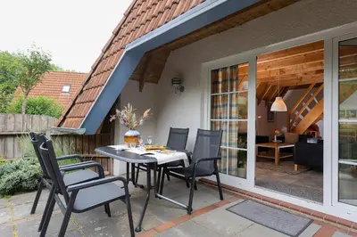 Ein Balkon oder eine Terrasse in der Unterkunft Ferienhaus Wittsand 11
