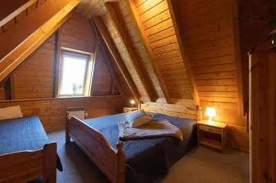 Ein Bett oder Betten in einem Zimmer der Unterkunft Ferienhaus Tegeler Plate 02