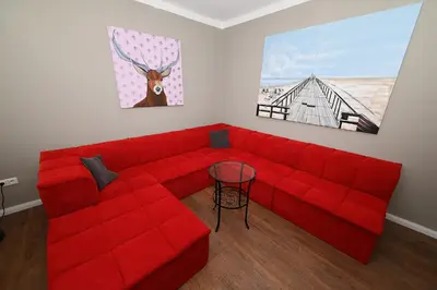 Ein Sitzbereich in der Unterkunft Wohnung Austernfischer