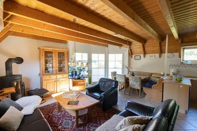 Ein Sitzbereich in der Unterkunft Ferienhaus Kniepsand 2