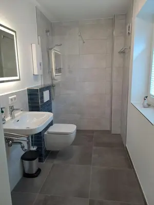 Ein Badezimmer in der Unterkunft Ferienwohnung Watt n Deichblick