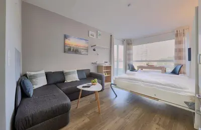 Ein Bett oder Betten in einem Zimmer der Unterkunft Frische Brise - 108