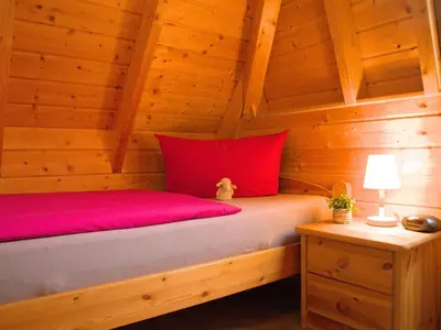 Ein Bett oder Betten in einem Zimmer der Unterkunft Ferienhaus Antje