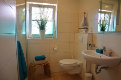 Ein Badezimmer in der Unterkunft Ferienhaus Strandkorb