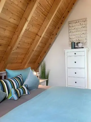 Ein Bett oder Betten in einem Zimmer der Unterkunft Ferienhaus Zimmers-Nordseehaus