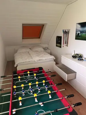 Ein Bett oder Betten in einem Zimmer der Unterkunft Haus am Meer