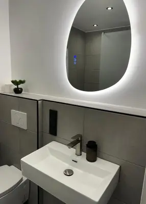 Ein Badezimmer in der Unterkunft Strandjuwel in der Seehütte Cuxhaven Duhnen- Exclusive Ferienwohnung am Strand mit Meerblick