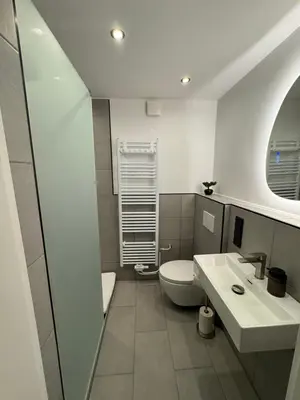 Ein Badezimmer in der Unterkunft Strandjuwel in der Seehütte Cuxhaven Duhnen- Exclusive Ferienwohnung am Strand mit Meerblick