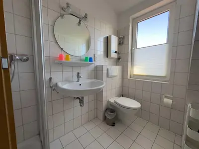 Ein Badezimmer in der Unterkunft Meerblick Apartment Nordseeperle 11
