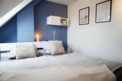 Ein Bett oder Betten in einem Zimmer der Unterkunft Ferienwohnung Küstenliebe