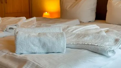 Ein Bett oder Betten in einem Zimmer der Unterkunft Nige Ooge FeWo 10