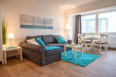 Ein Sitzbereich in der Unterkunft Strandhochhaus Sahlenburg FeWo C7