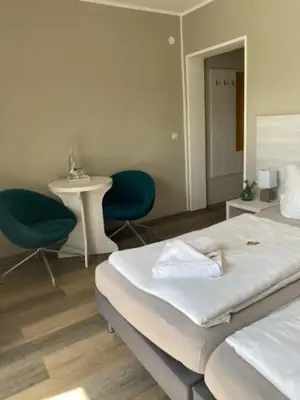 Ein Bett oder Betten in einem Zimmer der Unterkunft Pension Haus Meeresgruss