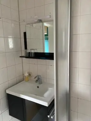 Ein Badezimmer in der Unterkunft Pension Haus Meeresgruss