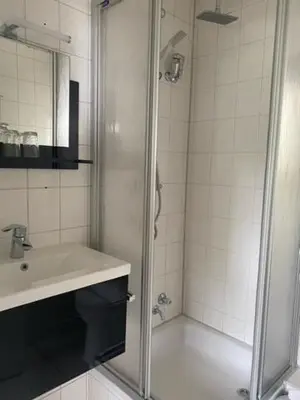 Ein Badezimmer in der Unterkunft Pension Haus Meeresgruss