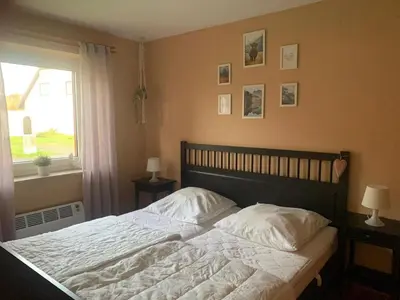 Ein Bett oder Betten in einem Zimmer der Unterkunft Emma & Mathilda - Wohnungen auch für Fellnasen