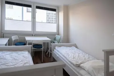 Ein Bett oder Betten in einem Zimmer der Unterkunft Haus Seemöwe, Whg 1