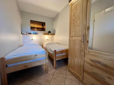 Ein Bett oder Betten in einem Zimmer der Unterkunft Kleiner Mövenschiß