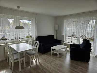 Ein Sitzbereich in der Unterkunft Haus Nordseewind XL - Apartment 1