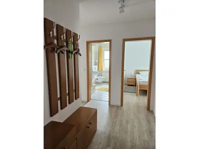 Ein Bett oder Betten in einem Zimmer der Unterkunft Haus Nordseewind XL - Apartment 3